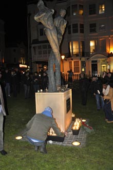 Hundreds attend candlelit vigil at Aids Memorial