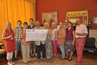 Deputy Mayor hands over £20,000 to three charities