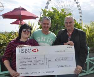 Pride organisers present Rainbow Fund cheque