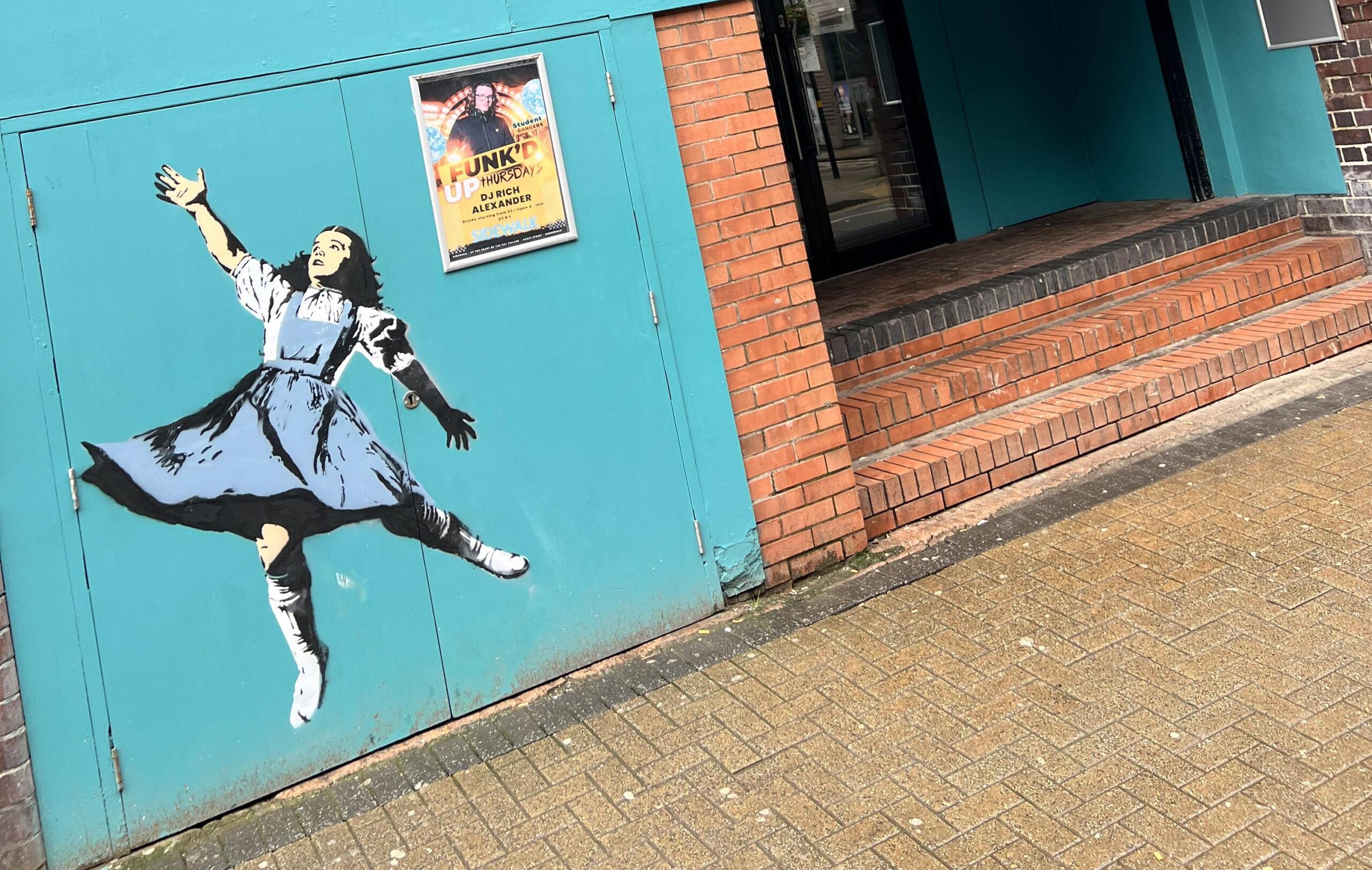 There’s no place like home! Banksy-esque artwork appears in Birmingham’s Gay Village